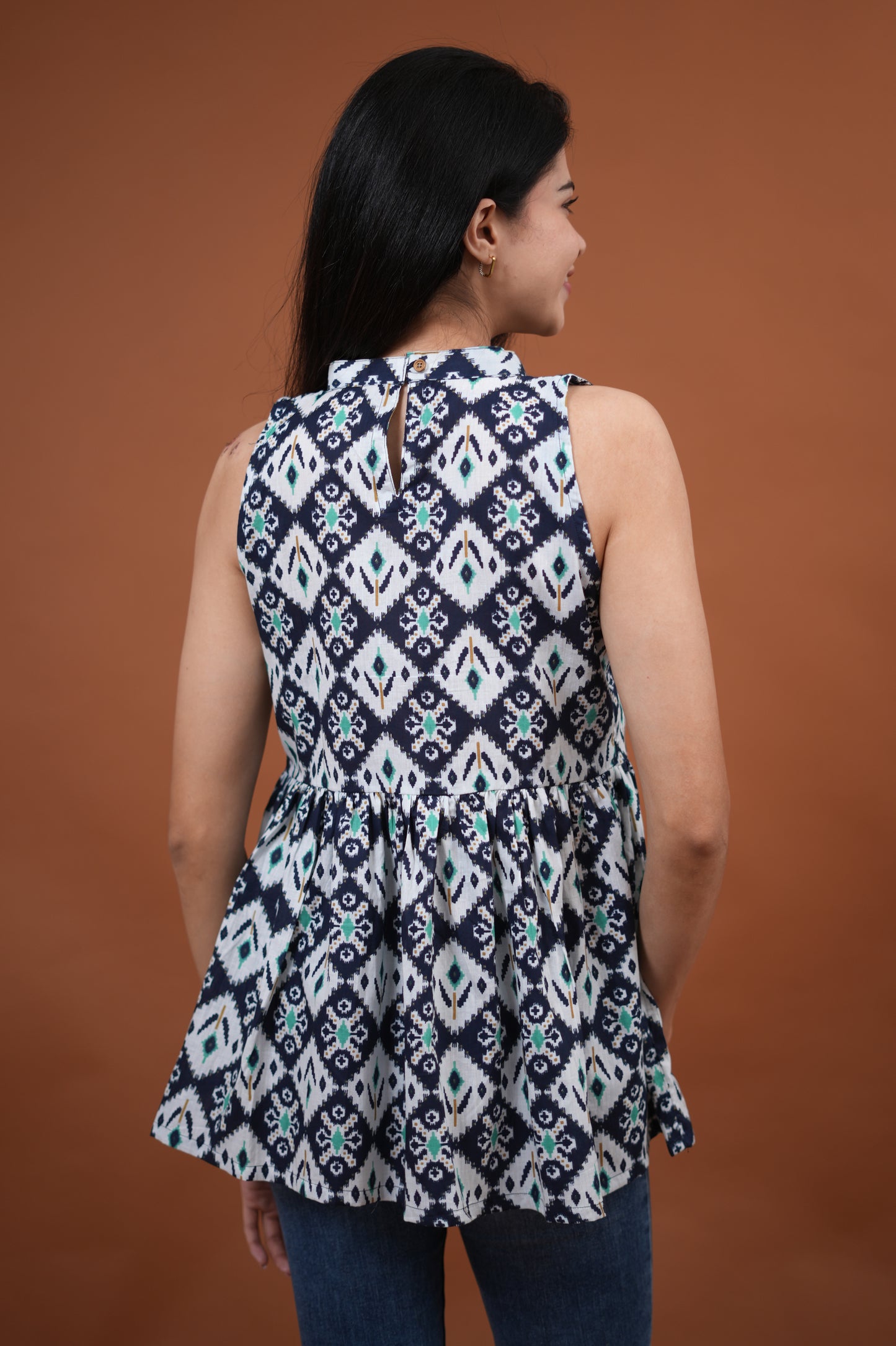 Aira Peplum Top